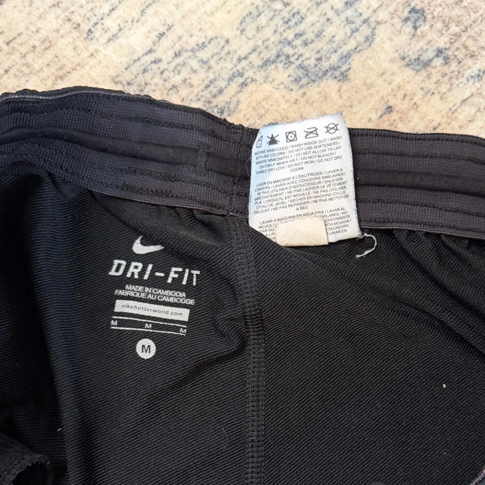 Nike Men's Black Joggers with Silver Logo